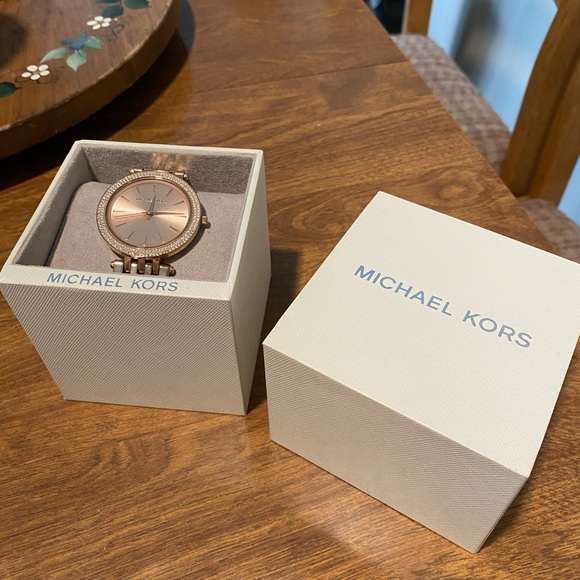 Like new Michael Kors rose gold watch with box and care instructions included. - Picture 3 of 14